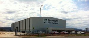 Exterior view of white Southern Steel warehouse